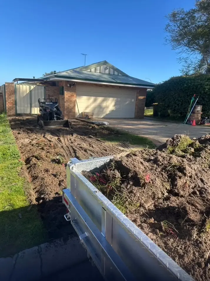 Front lawn turned into a red road gravel hardstand, start to finish